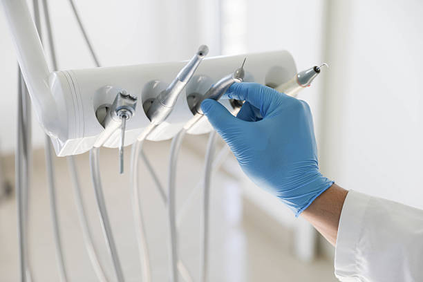 Professional Tooth Extraction technician working in Port Salerno, FL